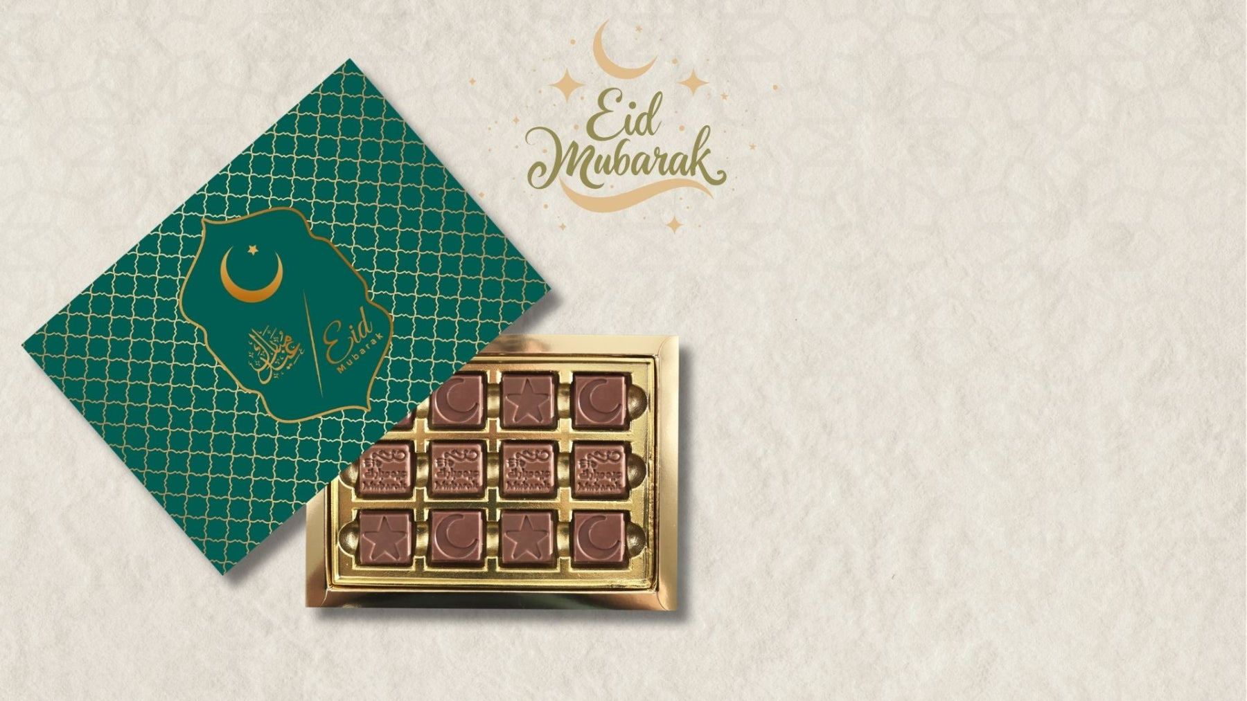 Box of chocolates with 'Eid Mubarak' card on a light background
